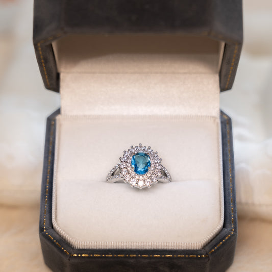 Adjustable Silver Ring - Blue Topaz & Zircon Halo Design